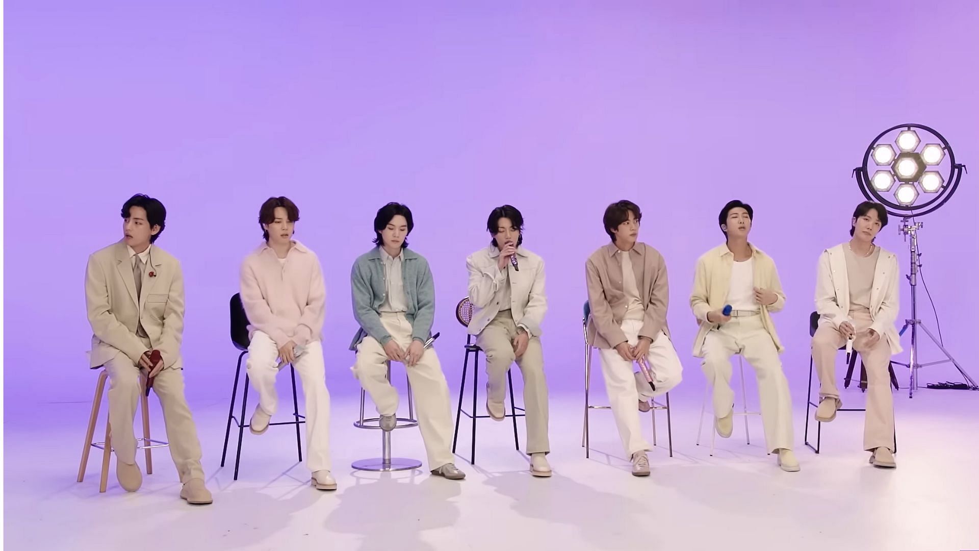 A scene from the group performing Take Two (image via YouTube/ @BANGTAN TV)